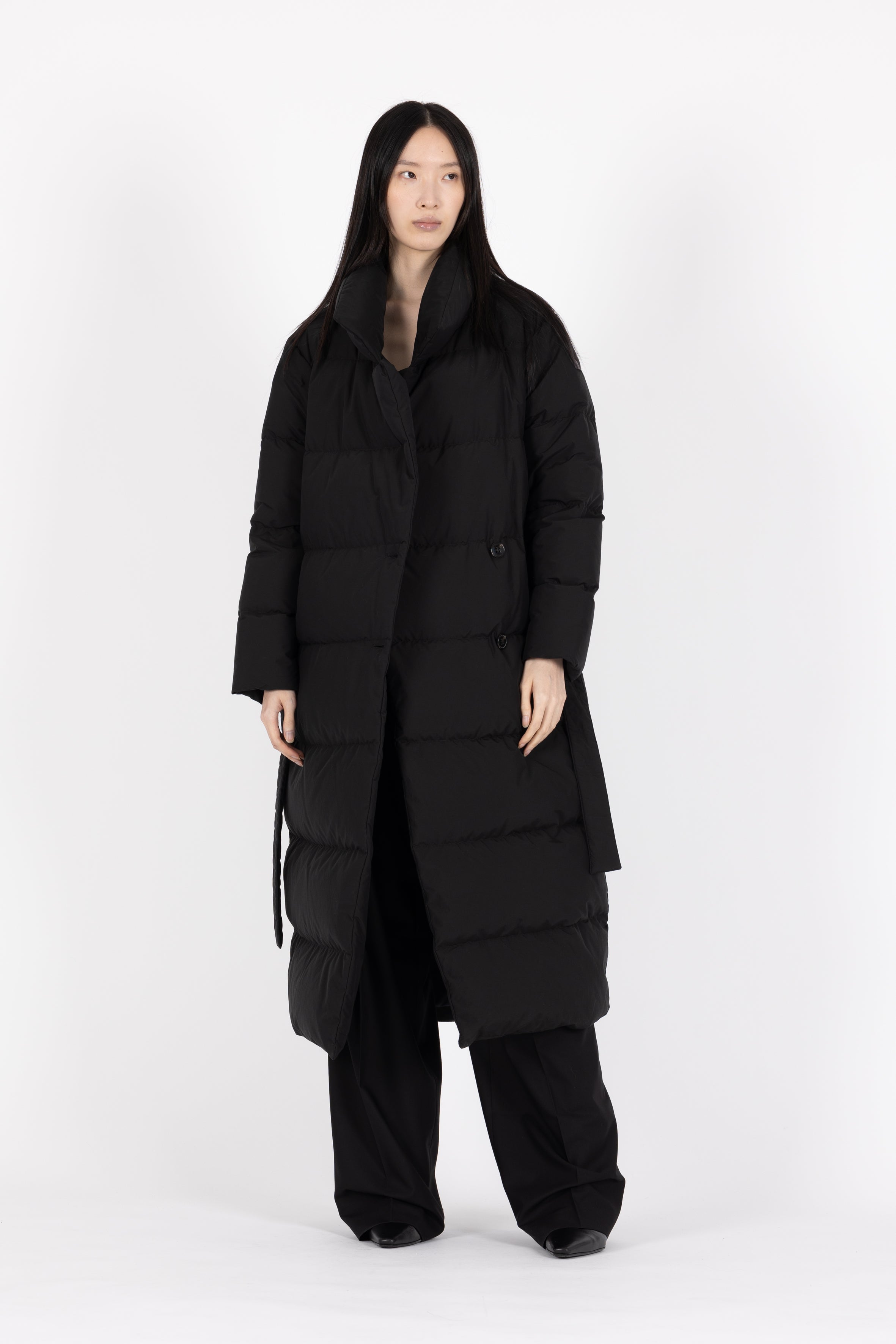 Long belted Lempelius Downcoat in the color black