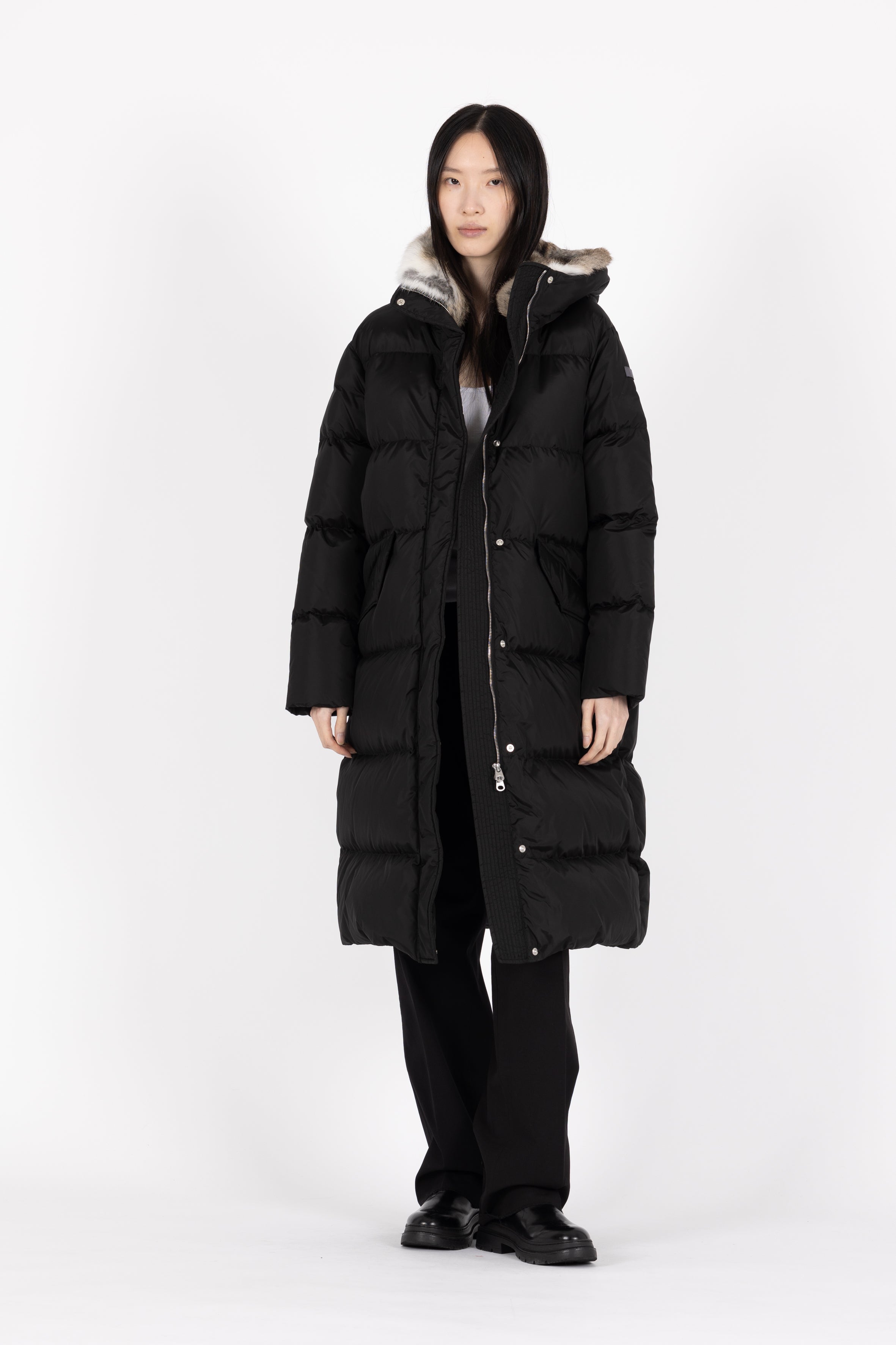 Long down coat in a dark color