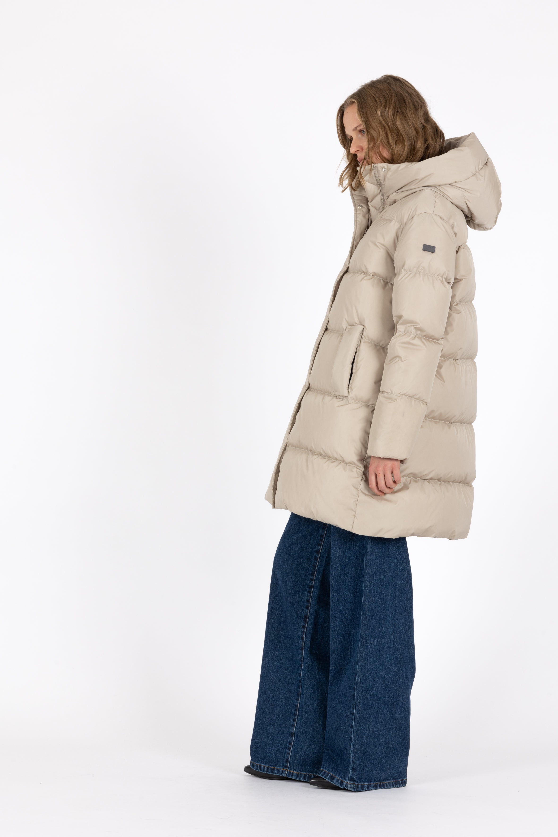 Minimal Lempelius down coat with welt pockets