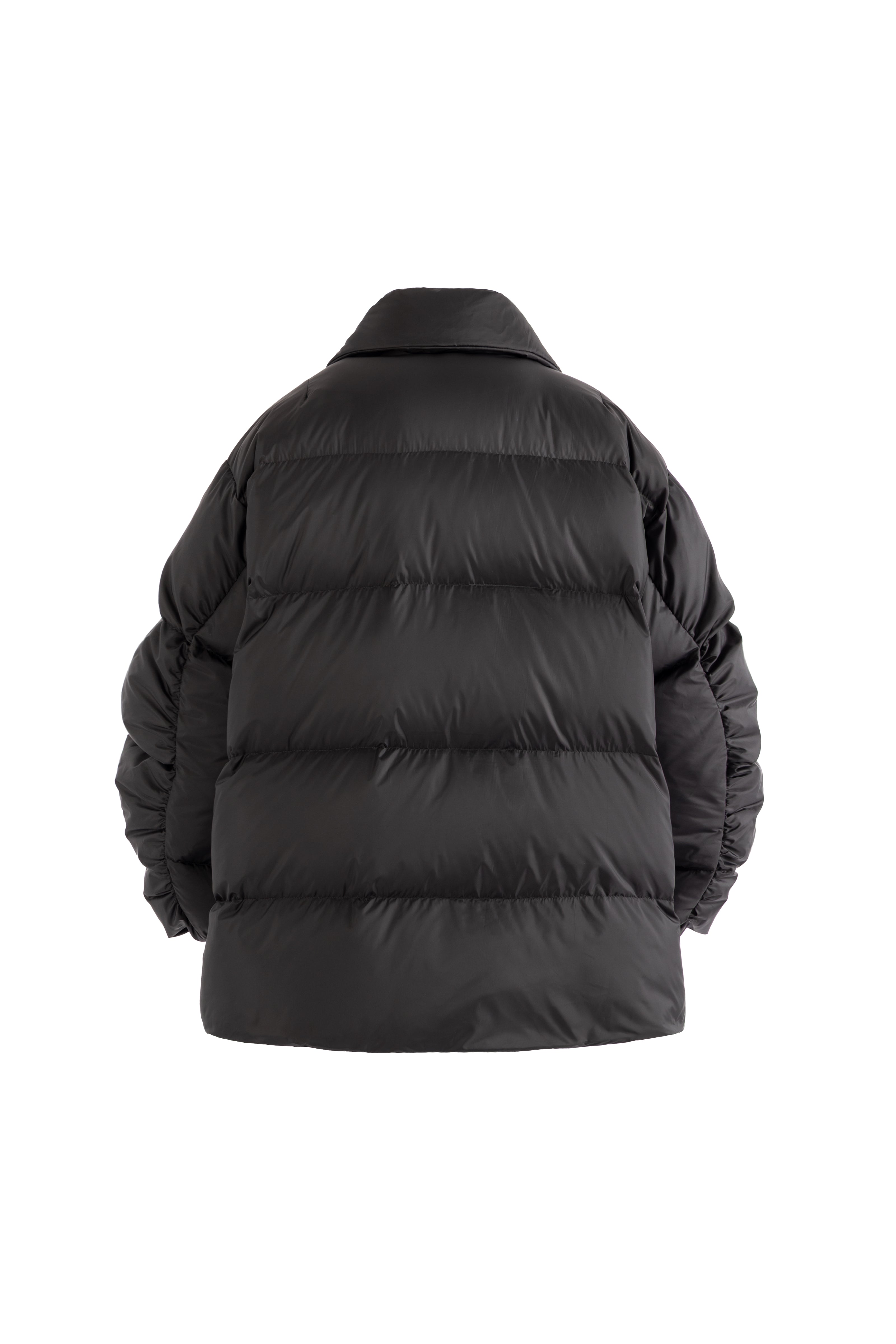 Black puffer jacket on a white background