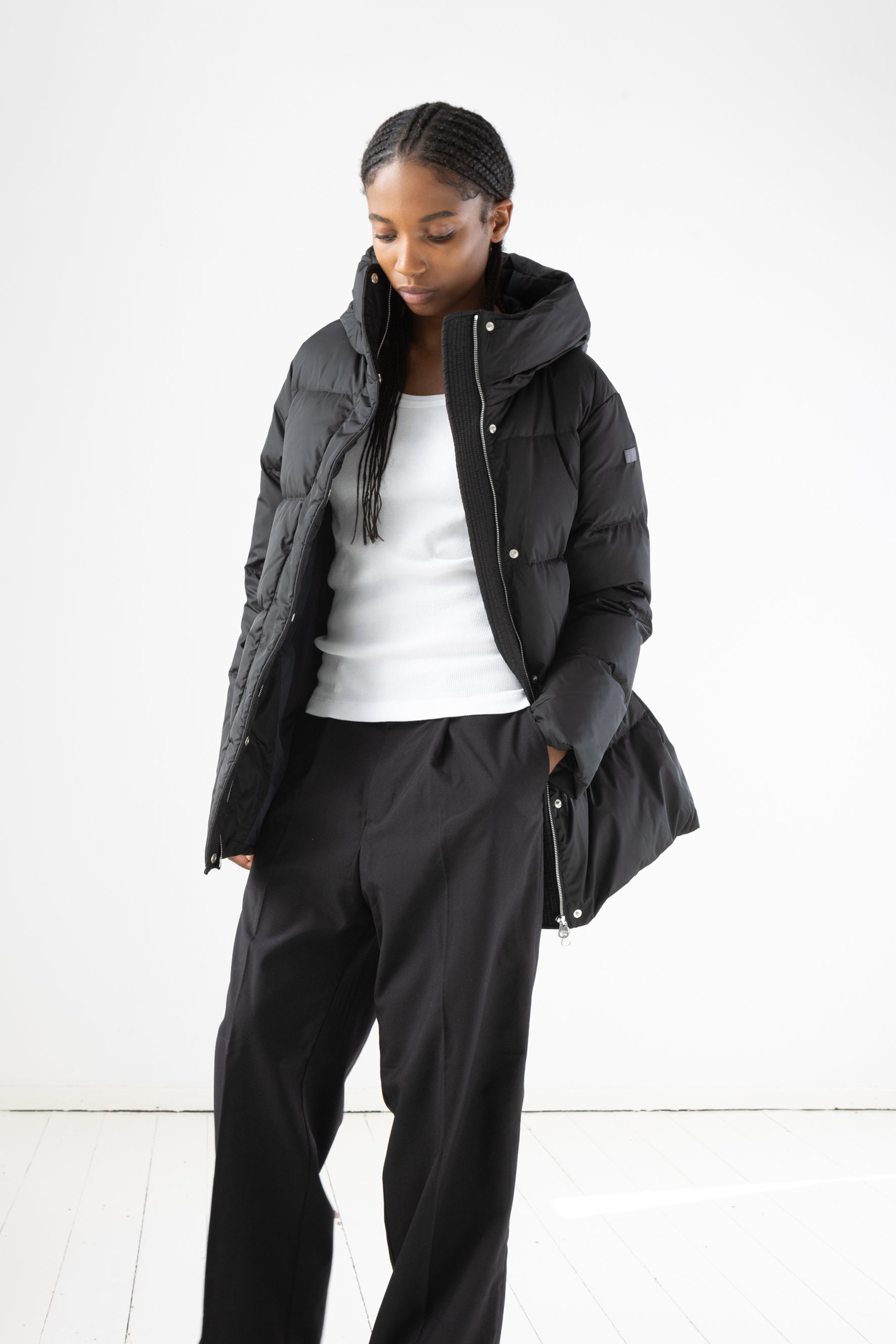 Short quilted down jacket with softly lined hood in black