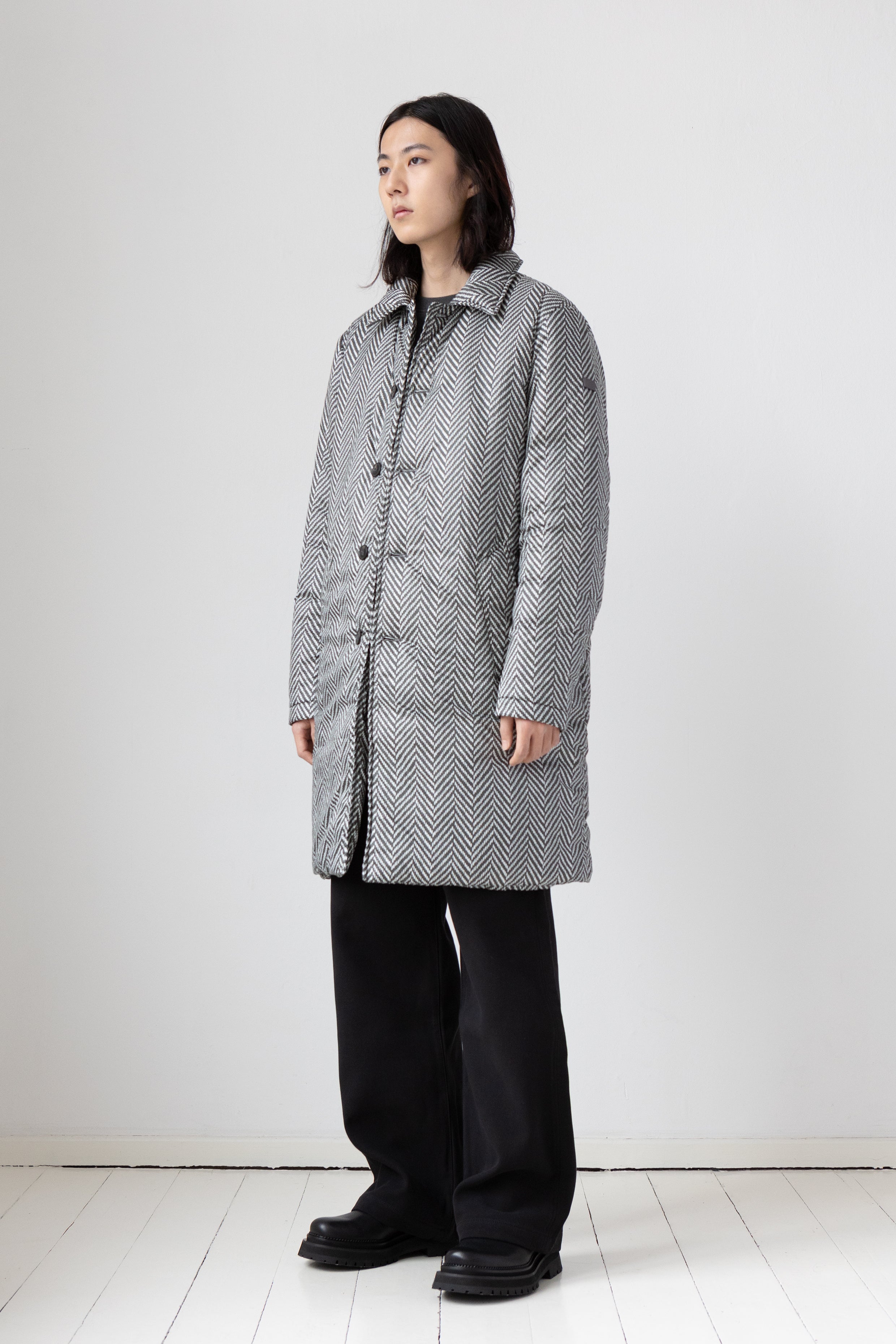 Soft padded Lempelius coat with a herringbone print