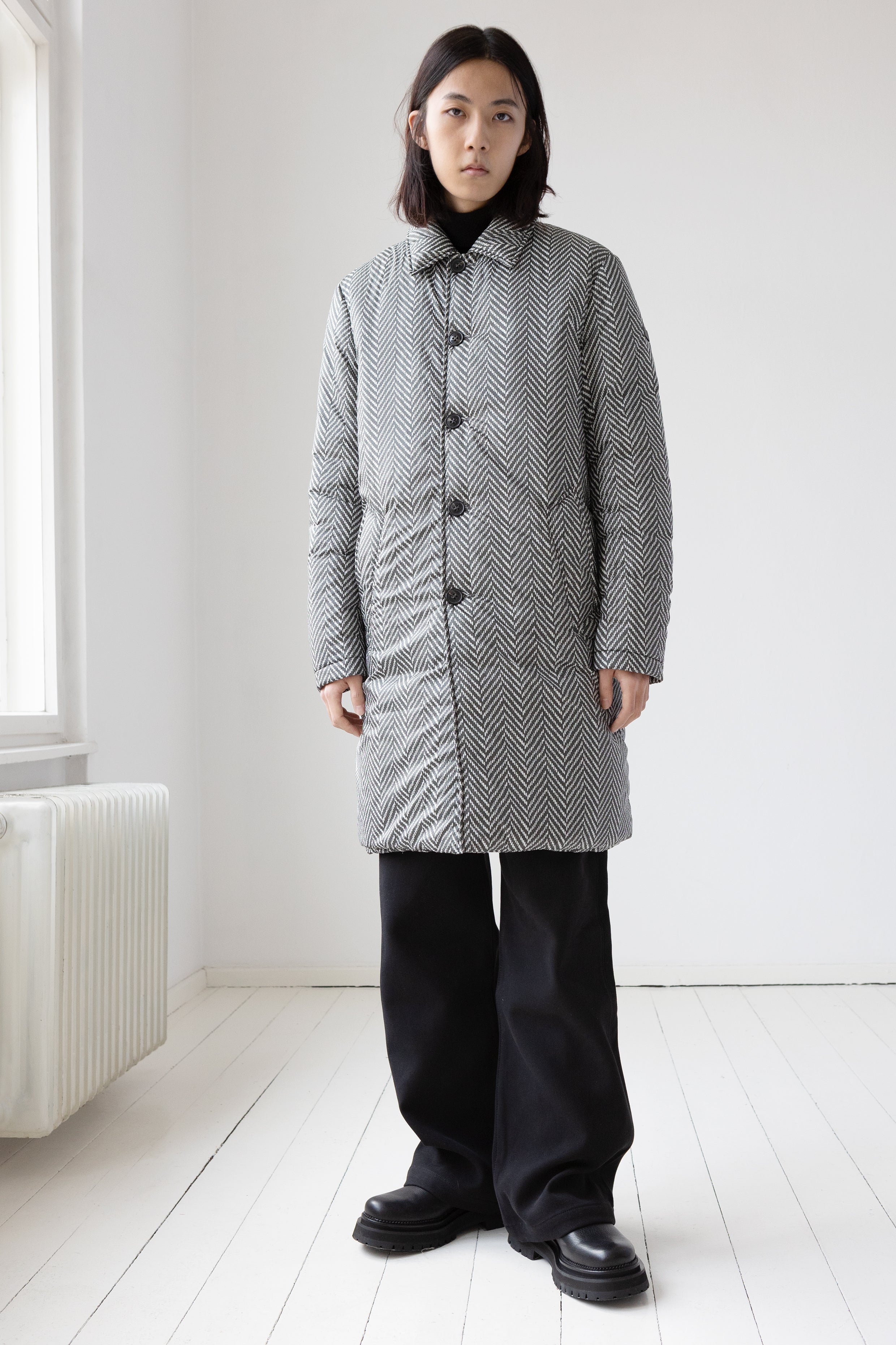 Soft padded Lempelius coat with a herringbone print