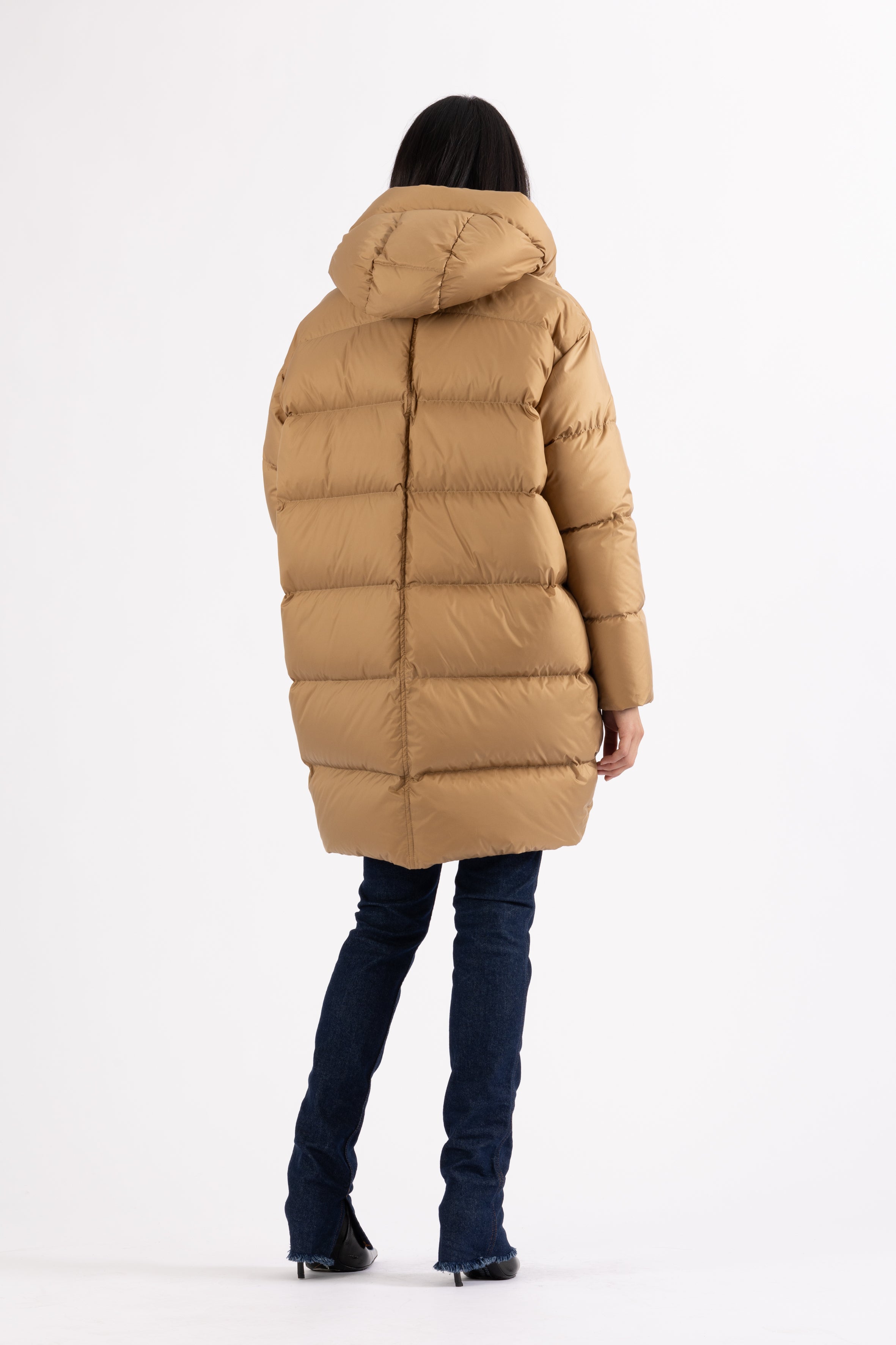 Mid‑length down parka with a cocoon shaped silhouette