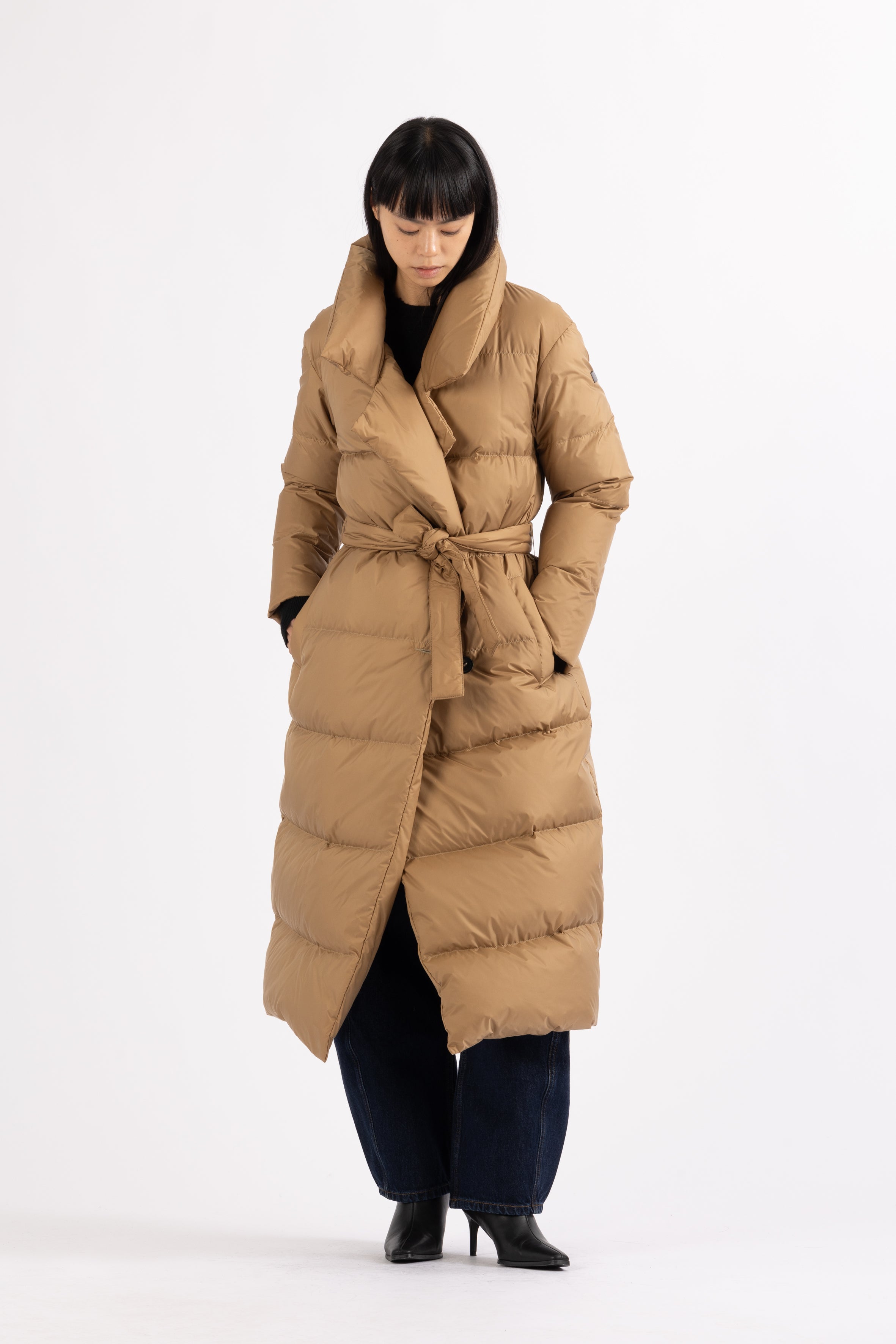 Long belted Lempelius down coat in the color biscuit