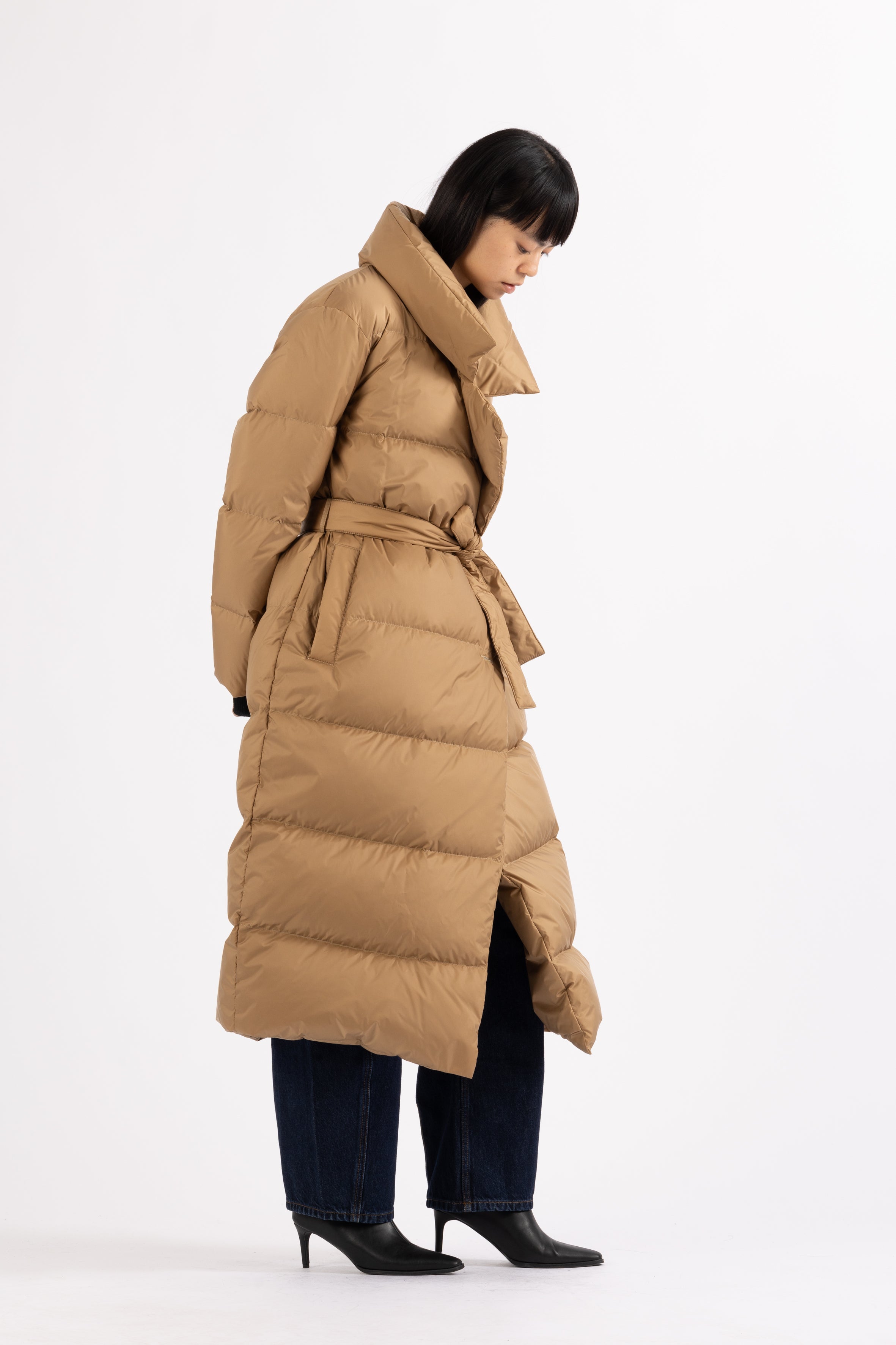 Long belted Lempelius down coat in the color biscuit