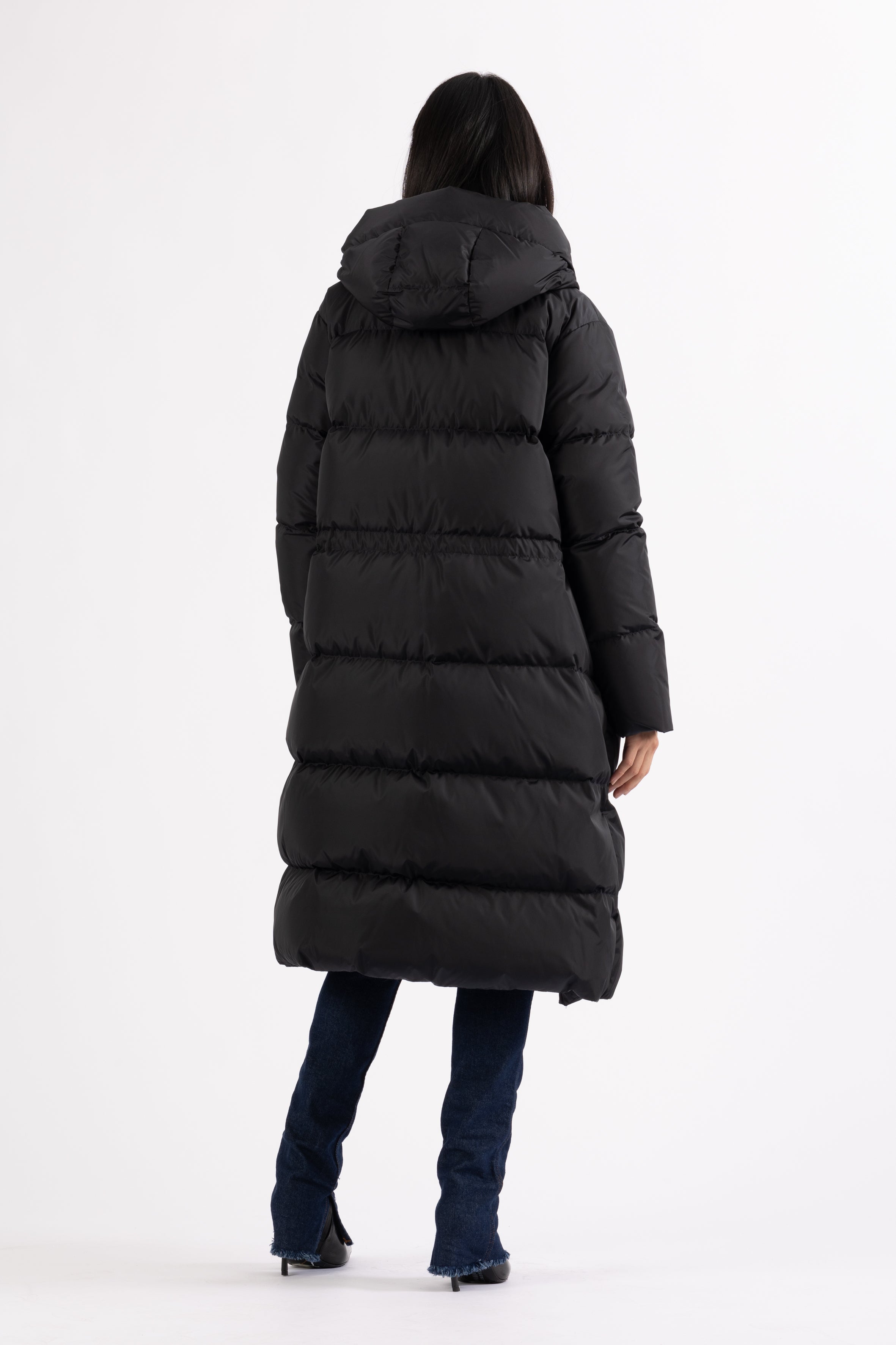 Long Lempelius Downcoat with a slim, slightly flared silhouette in back