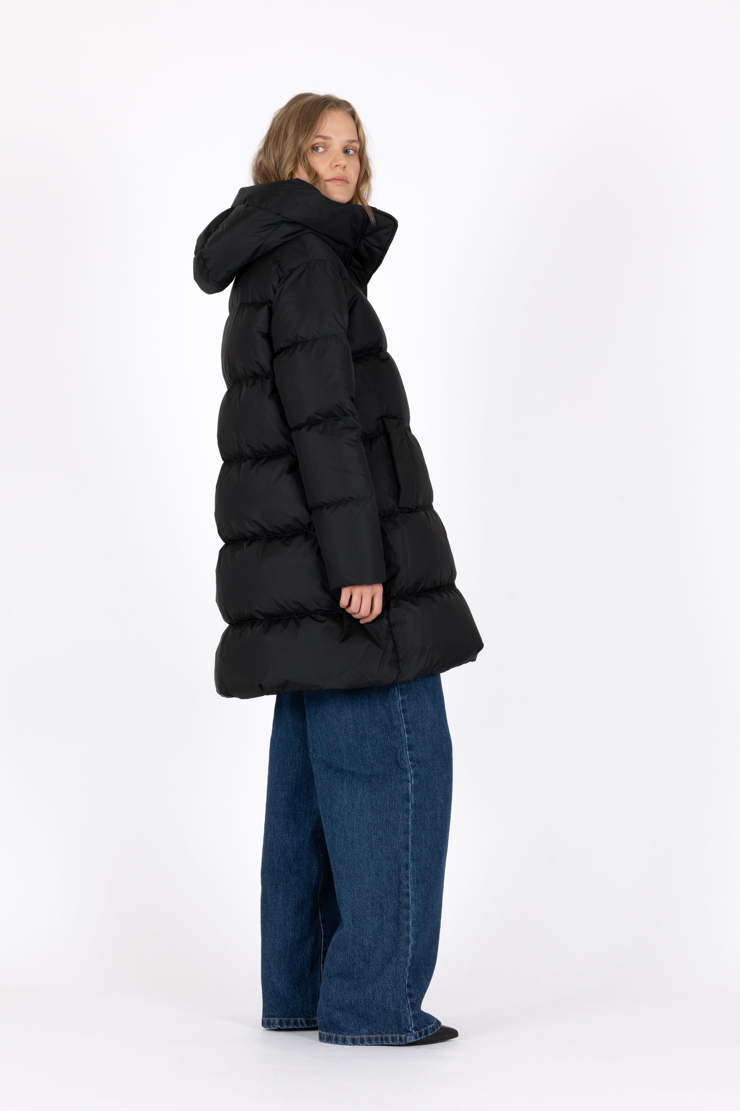 Minimal Lempelius down coat with welt pockets