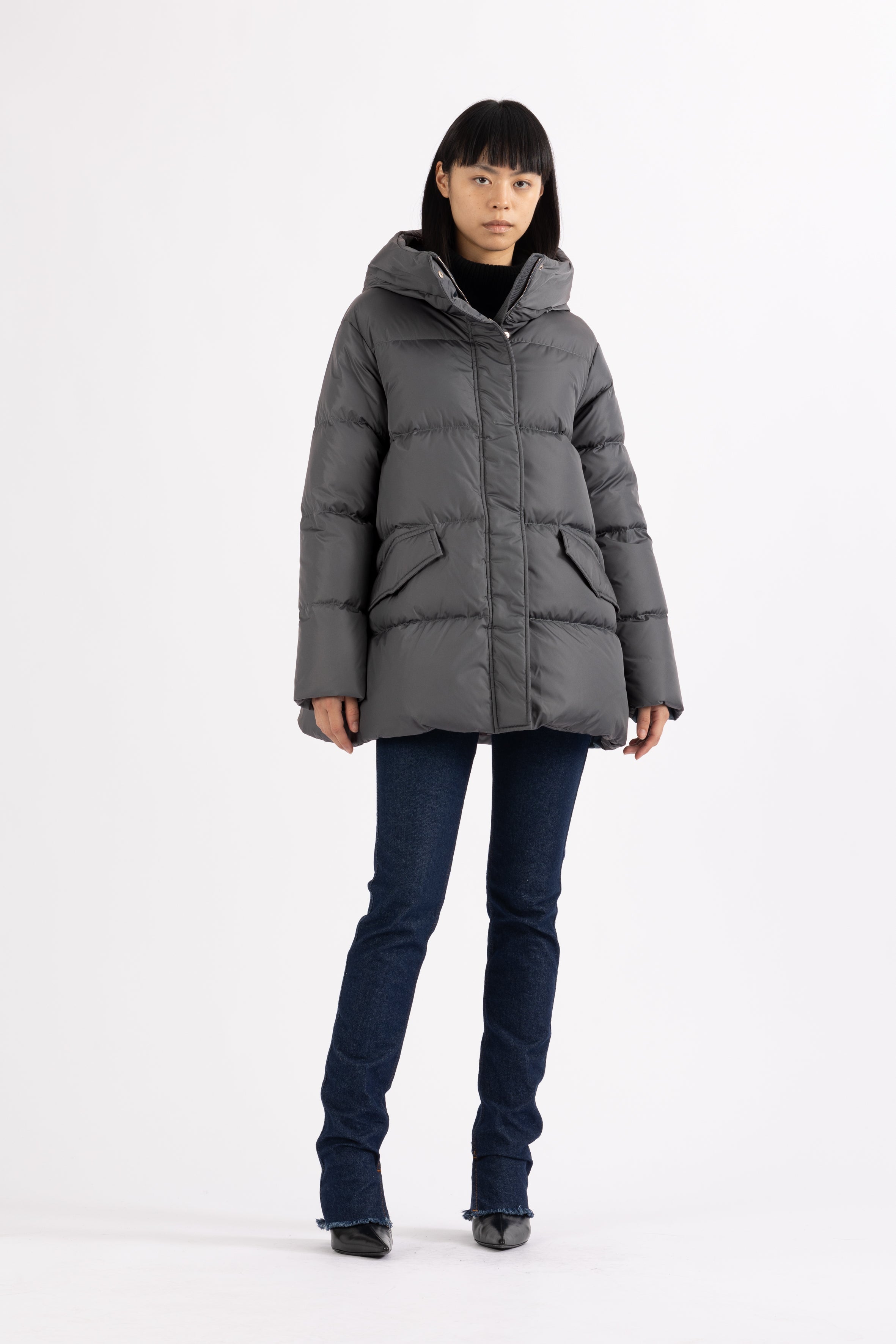 Short quilted down jacket with softly lined hood in iron grey