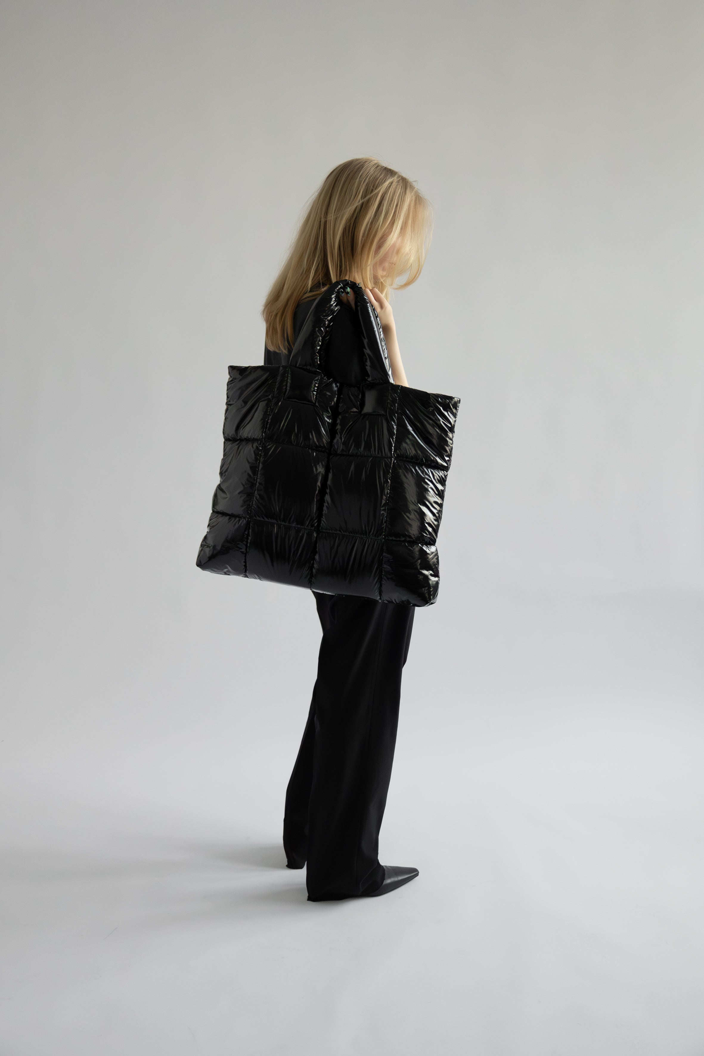 Lempelius coated Puffer bag in the color black