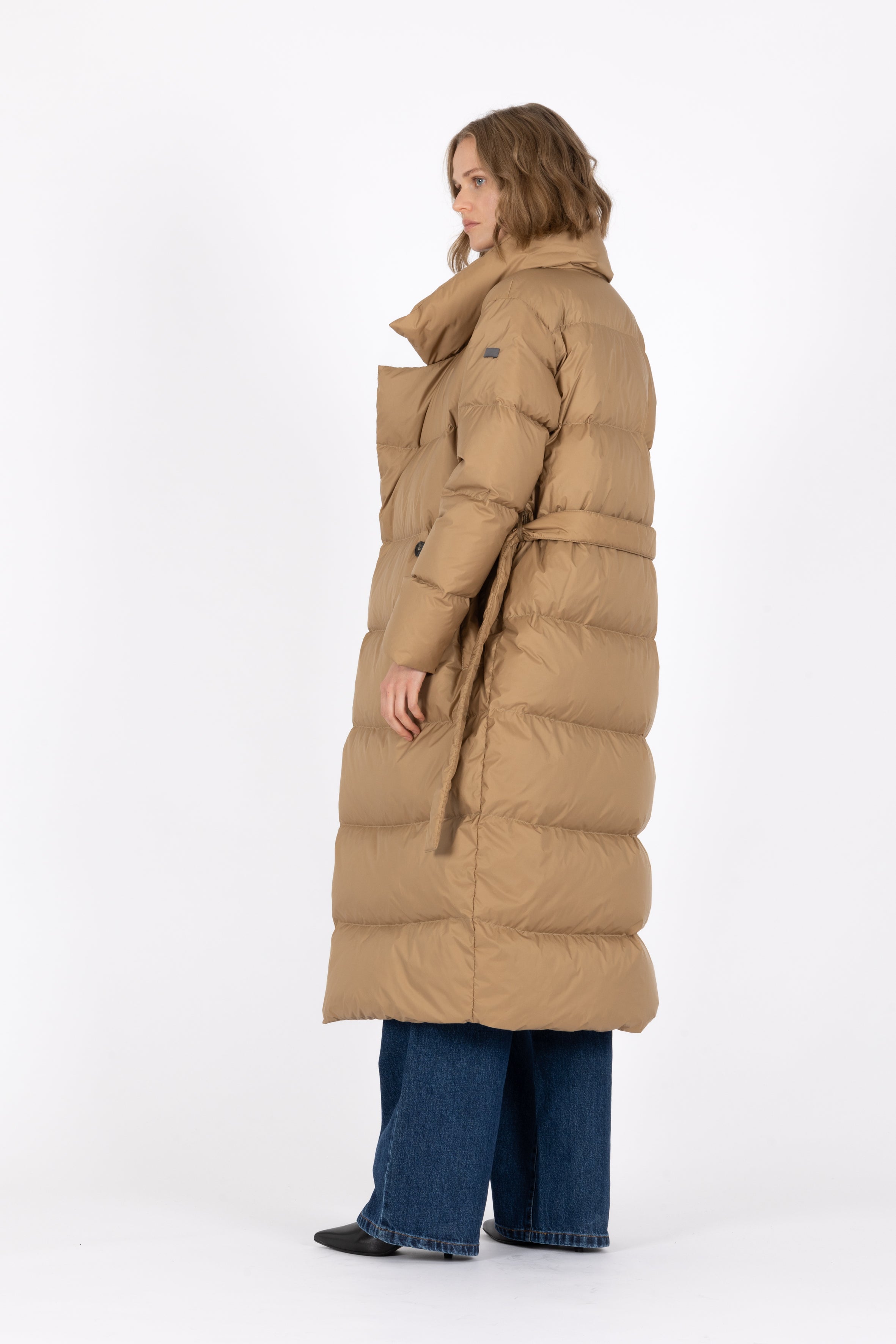 Long belted Lempelius down coat in the color biscuit 