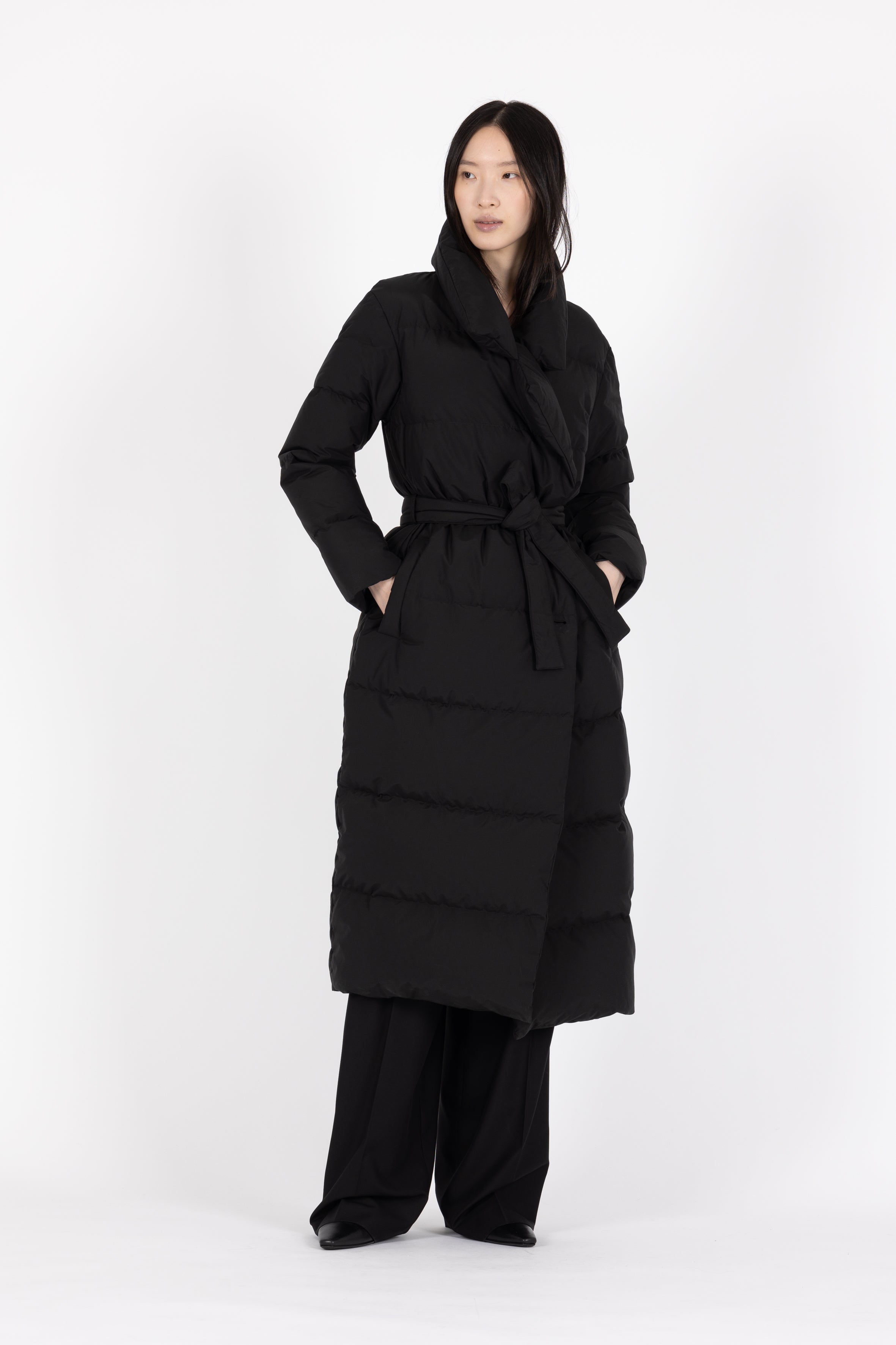Long belted Lempelius Downcoat in the color black
