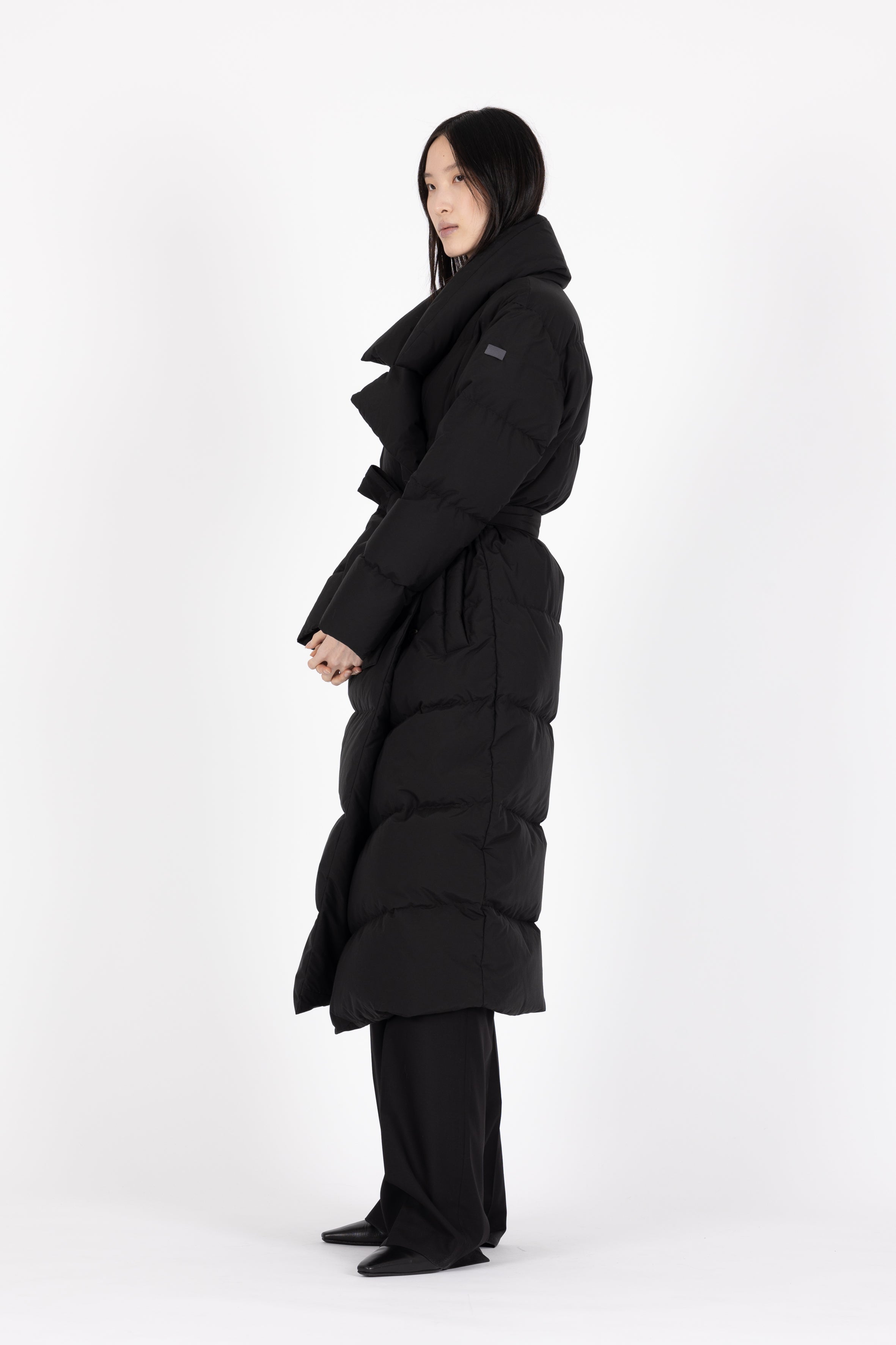 Long belted Lempelius Downcoat in the color black
